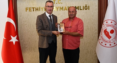 SEVİLEN KAYMAKAMA SEVİLEN KİTAP